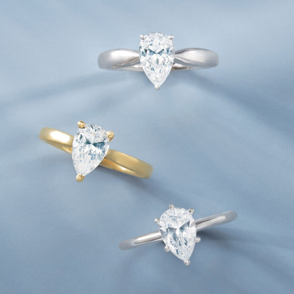 vertically set pear diamond engagement rings