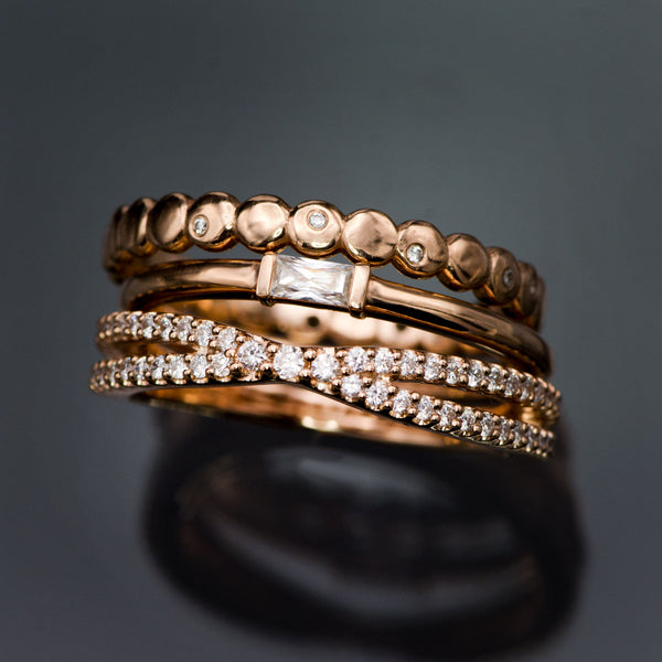 Rose gold ring stack with baguette moissanite and diamond bands
