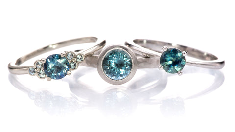 Dazzling teal sapphire engagement rings by Nodeform