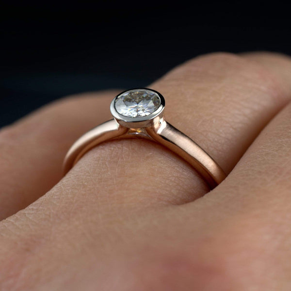  Moissanite on  rose gold and palladium  ring on hand