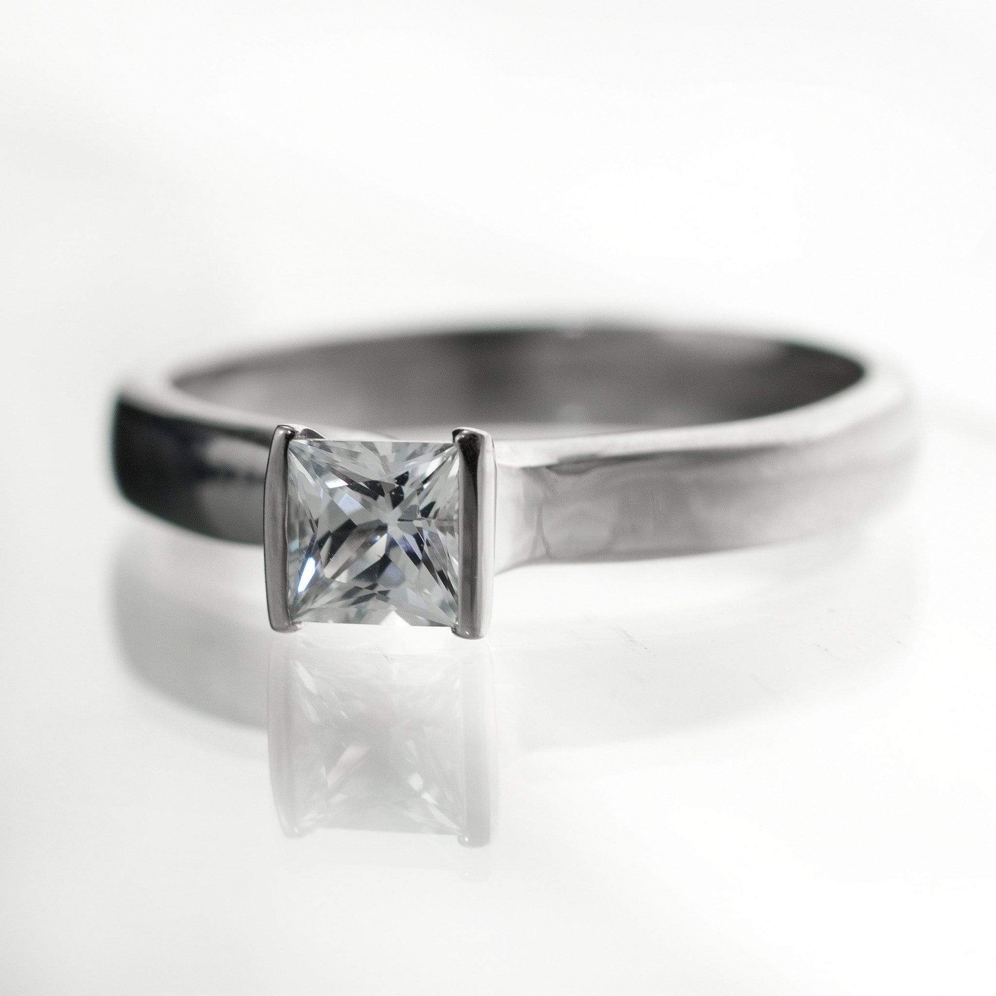 princess cut white sapphire ring