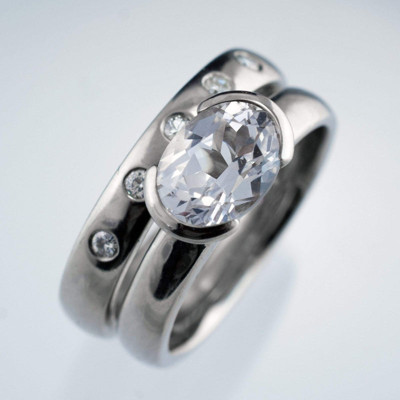 white sapphire solitaire ring