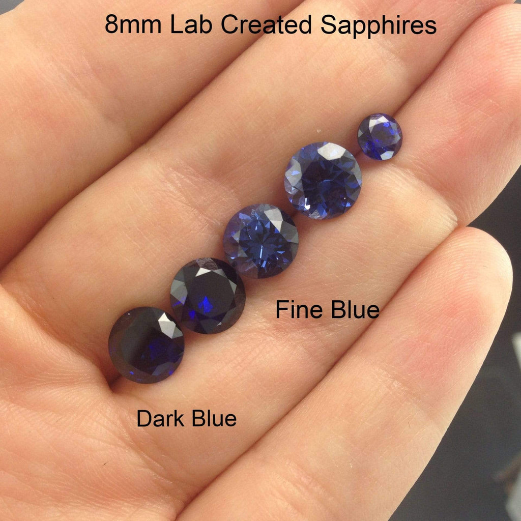 Lab Created Round Blue Sapphire Fold Solitaire Engagement Ring