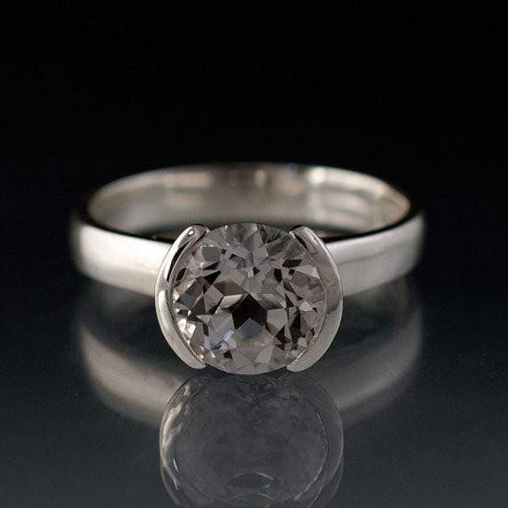lab created white sapphire engagement rings