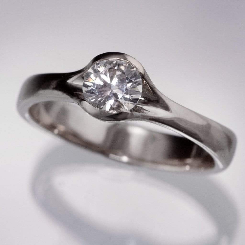 white sapphire solitaire ring