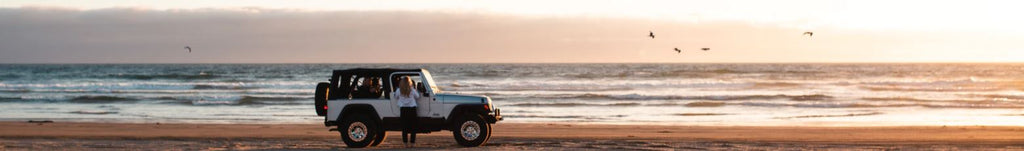 Jeep Wrangler on beach 