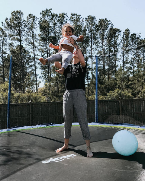 Mom and baby having fun on the Zupapa trampoline
