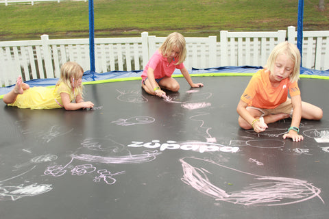 Chalk drawing on Zupapa 15 ft. trampoline mat