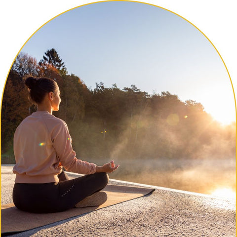 Woman yoga meditate sunrise