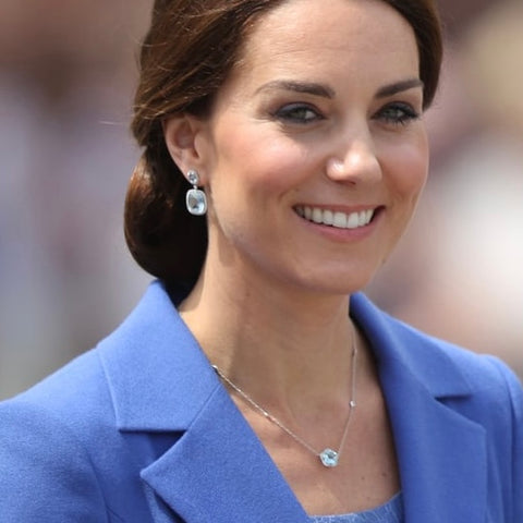 Princess Kate Middleton, Catherine Duchess of Cornwall and Cambridge, wears a beautiful blue topaz necklace and earring set