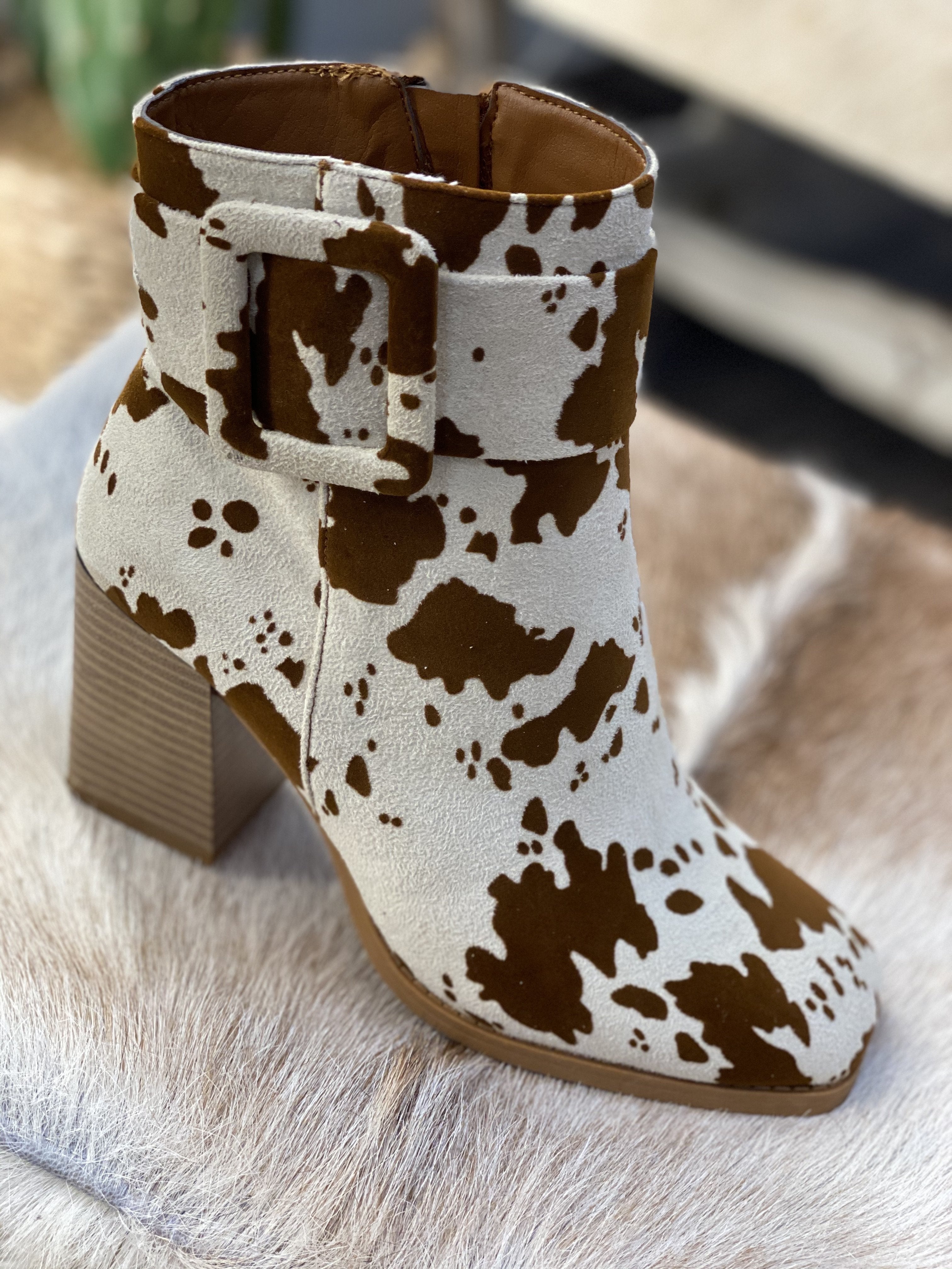 womens cow print boots