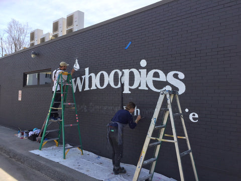painters painting cape whoopies bakery sign