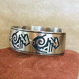 Genuine Hopi overlay cuff with clouds, rain and other weather symbols JK110