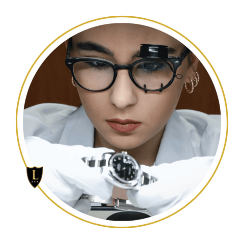 How to care for your luxury watch, woman scientist inspecting a Rolex.