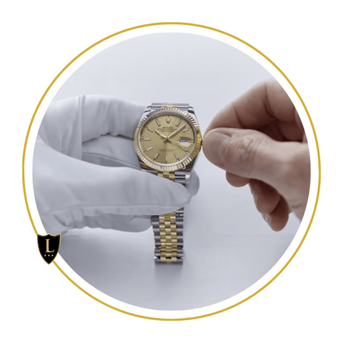 Hand and hand with handkerchief servicing a Rolex watch.
