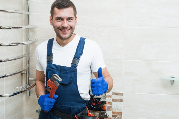 plumber fixing water softener