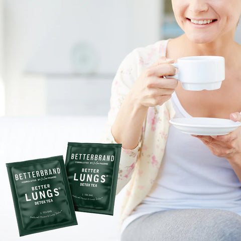 woman drinking BetterLungs Mullein Tea for lung detox