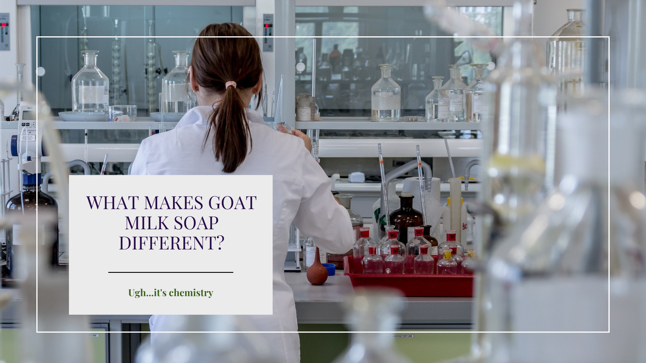 A chemist working at their chemistry bench with a white box that contains text