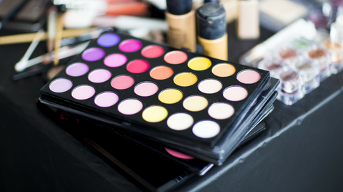 An image of a colorful pallet of eye shadow