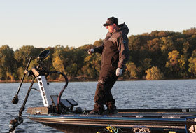 Action Photography: Men's Vapor Pro Insulated Tri-Laminate Bib Pant performing IRL 15