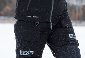 Action Photography: Men's Vapor Pro Insulated Tri-Laminate Bib Pant performing IRL 22