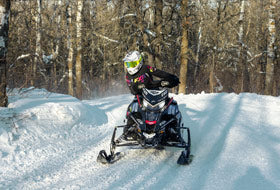 Action Photography: Women's Team FX Jacket performing IRL 8