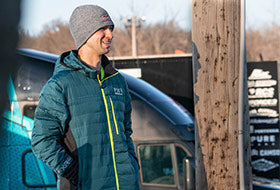 Action Photography: Men's Podium Hybrid Quilted Hoodie performing IRL 7