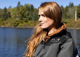 Action Photography: Women's Adventure Tri-Laminate Jacket performing IRL 4