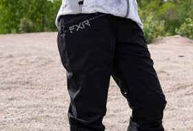 Action Photography: Women's Adventure Tri-Laminate Pant performing IRL 3