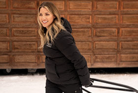 Action Photography: Women's Elevation Pro Down Jacket performing IRL 1