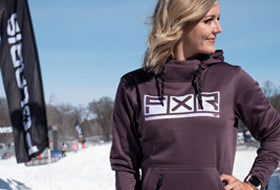 Action Photography: Women's Podium Tech Pullover Hoodie performing IRL 1