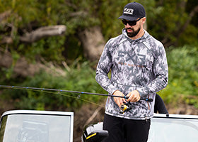 Action Photography: Men's Tournament Pro Hybrid UPF Pullover Hoodie performing IRL 5