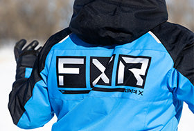 Action Photography: Men's Recruit F.A.S.T. Insulated Monosuit performing IRL 7