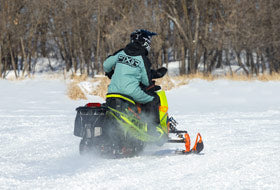 Action Photography: Women's Recruit F.A.S.T. Insulated Monosuit performing IRL 1