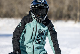 Action Photography: Women's Recruit F.A.S.T. Insulated Monosuit performing IRL 3