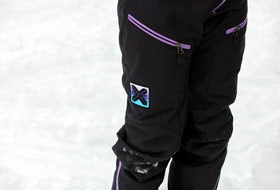 Action Photography: Women's Recruit F.A.S.T. Insulated Monosuit performing IRL 8