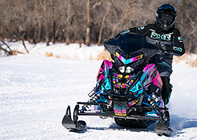 Action Photography: Women's Maverick F.A.S.T. Insulated Monosuit performing IRL 10