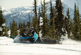 Action Photography: Women's Maverick F.A.S.T. Insulated Monosuit performing IRL 7