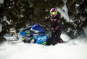 Action Photography: Women's Maverick F.A.S.T. Insulated Monosuit performing IRL 3