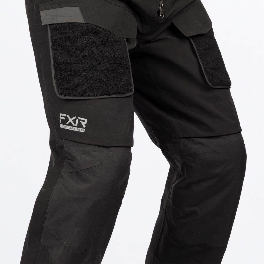 Image of FXR's Vapor Pro Bib Pant, featuring the front thigh bellowed pockets with velcro flaps