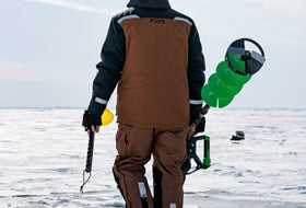 Action Photography: Men's Excursion Ice Pro Bib Pant performing IRL 15