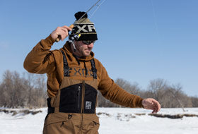 Action Photography: Men's Excursion Ice Pro Bib Pant performing IRL 12