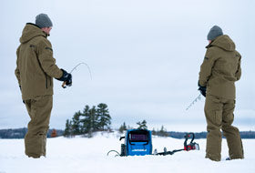 Action Photography: Unisex Task Insulated Canvas Bib Overall performing IRL 8