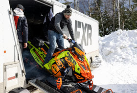 Action Photography: Men's Podium Hybrid Quilted Vest performing IRL 8