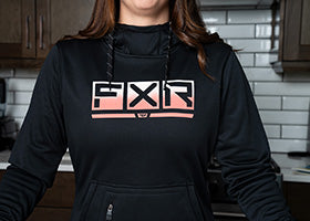 Action Photography: Women's Podium Tech Pullover Hoodie performing IRL 2