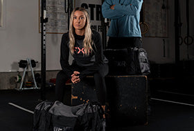 Action Photography: Women's Trainer Lite Premium Pullover Hoodie performing IRL 3