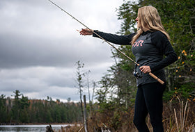 Action Photography: Women's Trainer Lite Premium Pullover Hoodie performing IRL 5