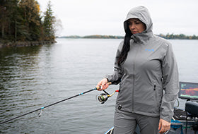 Action Photography: Women's Adventure Lite Tri-Laminate Jacket performing IRL 7