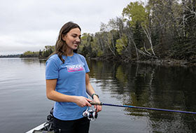 Action Photography: Women's Podium Premium T-Shirt performing IRL 4