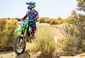 Action Photography: Podium MX Pant performing IRL 1